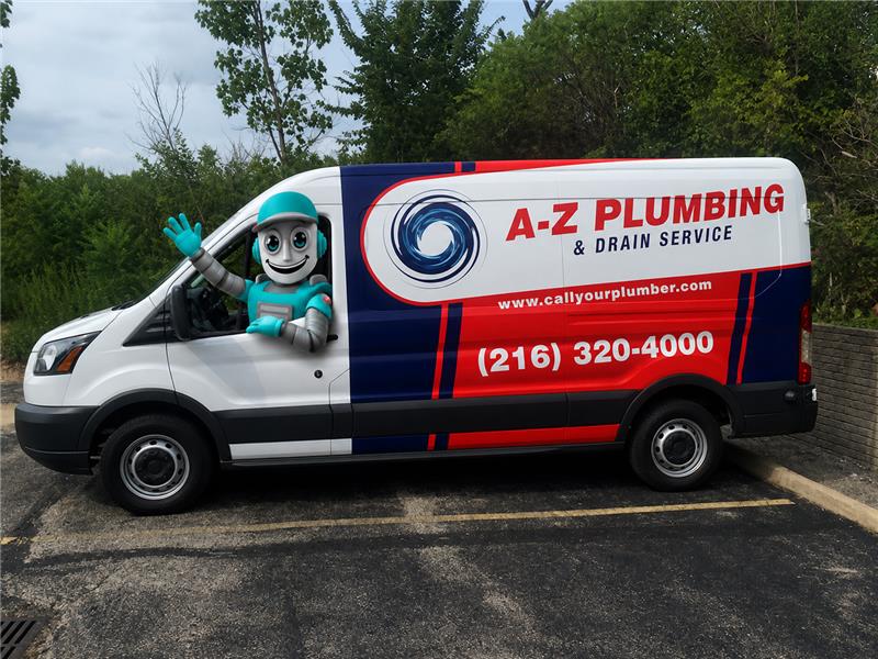 Arco robot mascot in an A-Z Plumbing and Drain service truck